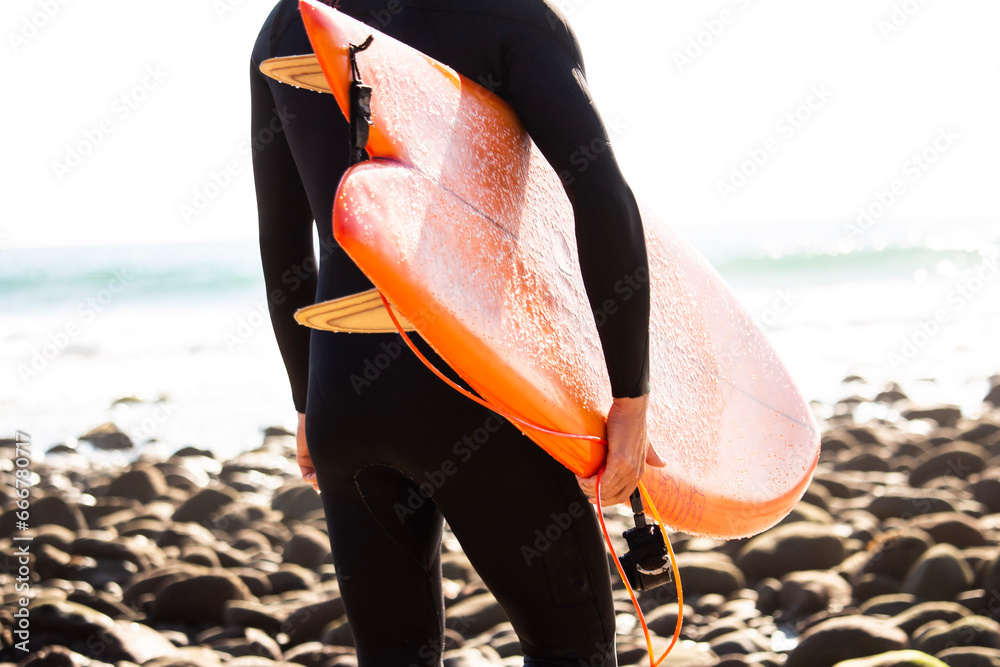 Twin fin orange surfboard